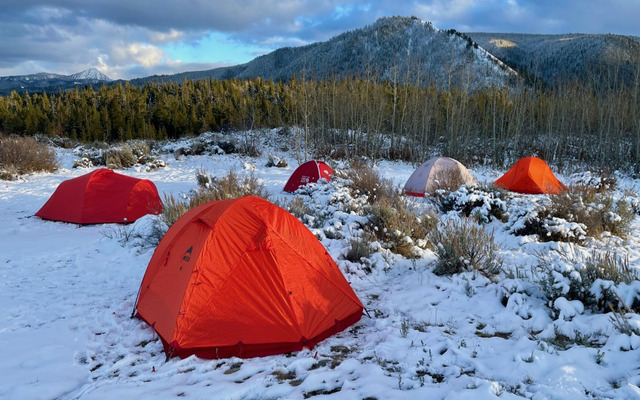  Use a four-season camping tent