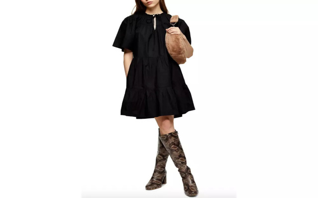  A black shirt dress with tiered ruffles for a casual winter wedding