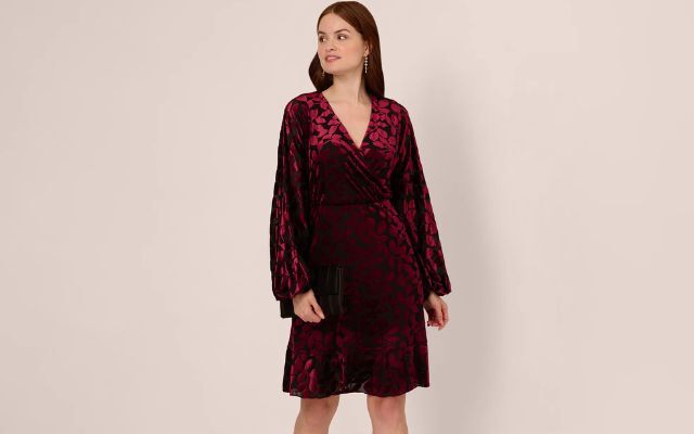  A long-sleeve faux wrap dress made from velvet