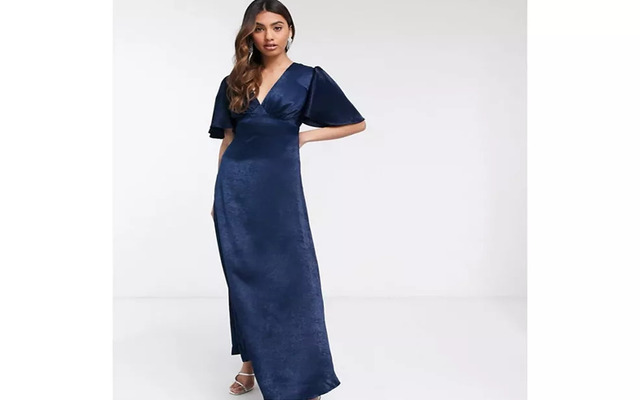  An elegant satin gown with flutter sleeves